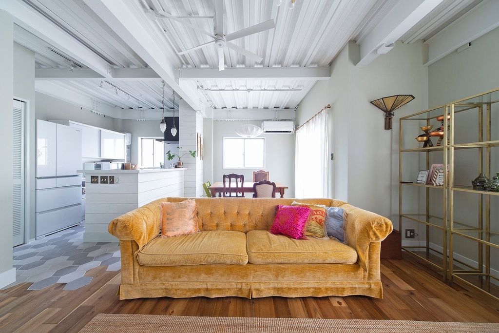 hacorenove style interior, Japanese apartment kitchen-dining, exposed concrete ceiling, wooden beam lattice, plywood cabinetry, oak flooring, white pendant light, natural daylight, industrial-warm atmosphere, minimalist urban living